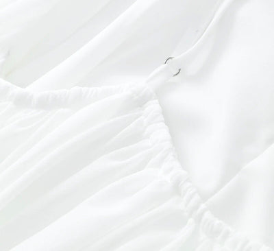 Mio™ | Elegante mini-jurk met blootgestelde rug